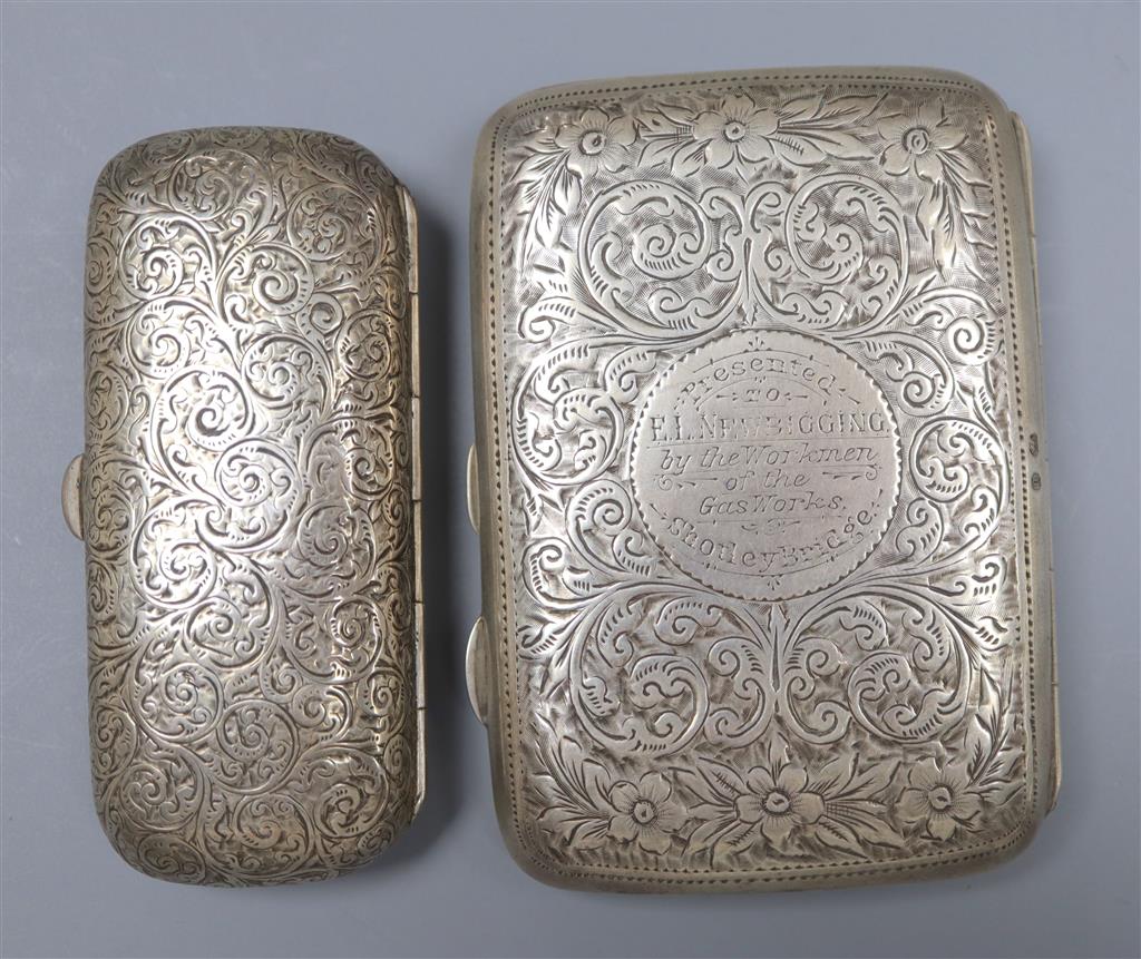A silver cigarette case and a Victorian silver cheroot holder, 79mm.